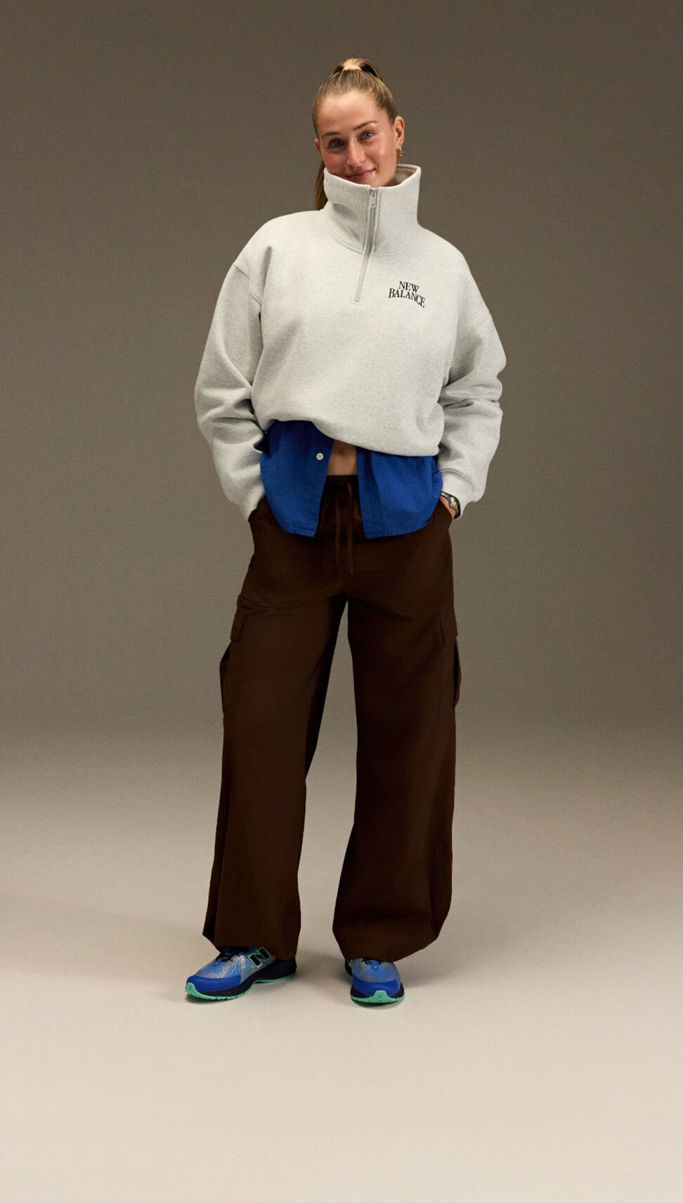 Jordyn Huitema standing in front of a gray backdrop. 