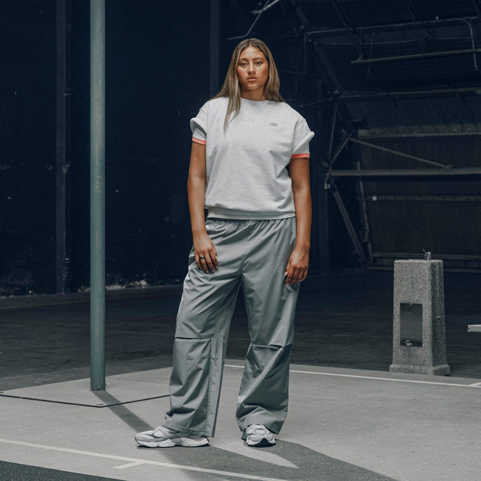 Sienna Betts wearing a pair of grey 9060s